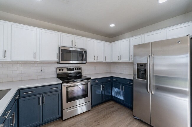 Building Photo - Spacious 5-Bedroom Home with Open Layout & Private Backyard