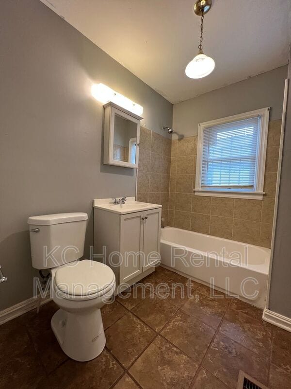 Building Photo - 2430 E 67th Terrace