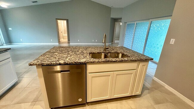 Building Photo - 4 Bedroom 2 Bathroom 2 Car Garage Home - NW Cape Coral - Available Mid April