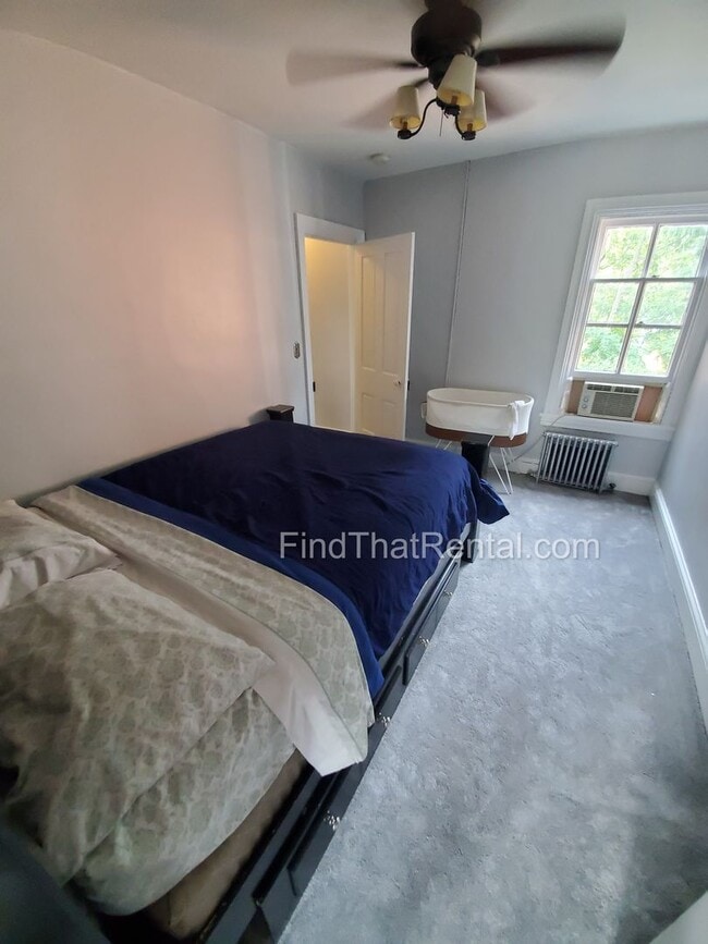 Building Photo - Charming Historic Retreat with Private Fenced Yard & Parking – Prime Downtown Location