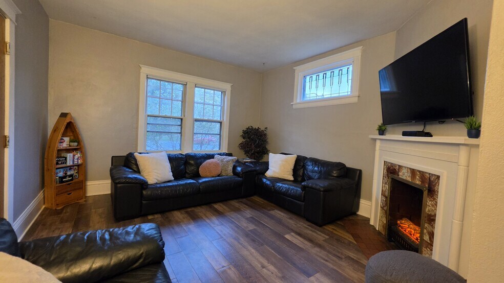 Cozy living room ambiance—perfect for relaxing after work or exploring Duluth. - 822 E 4th St