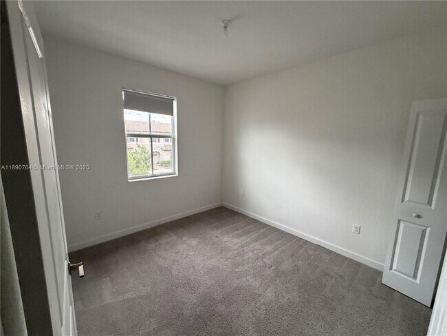 Building Photo - 12390 NW 23rd Ct