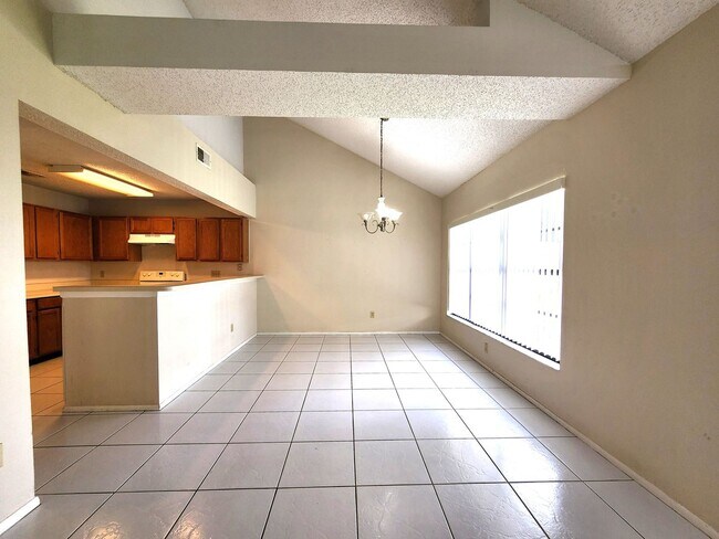 Building Photo - Open Layout; Fenced-in Yard; Quiet Neighbo...