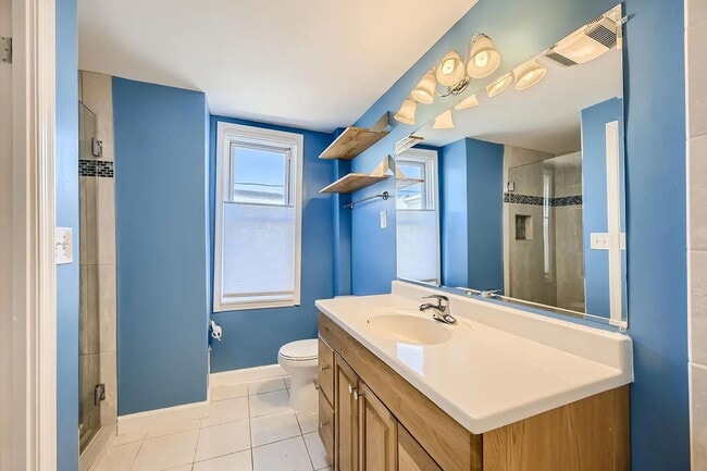 Building Photo - Charming 3 Bedroom/2.5 Bathroom Townhome in Patterson Park with Parking Pad!