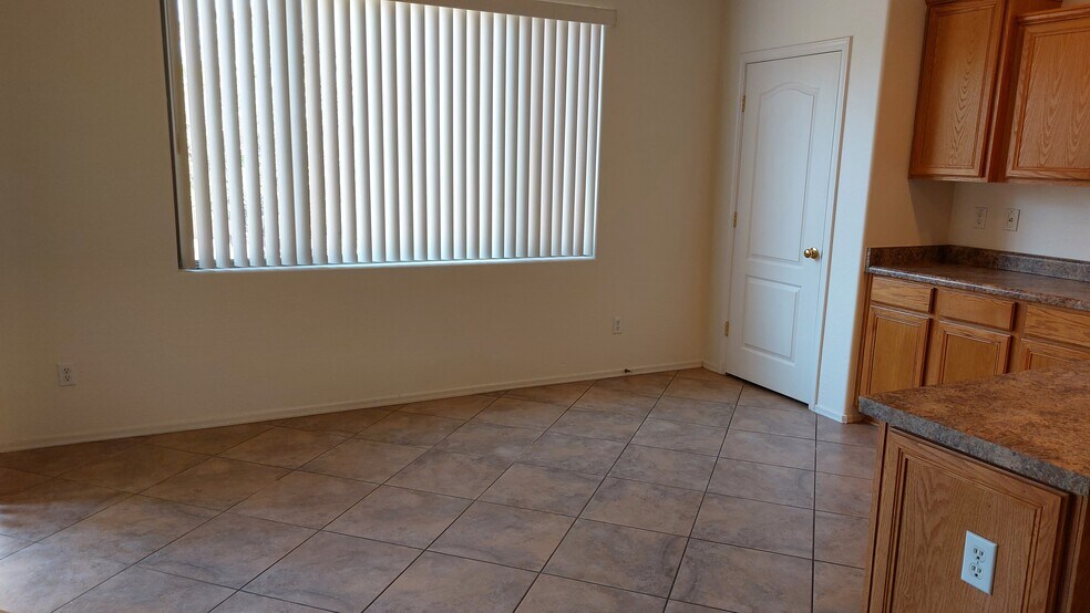 Kitchen Dining Area - 8763 W State Ave