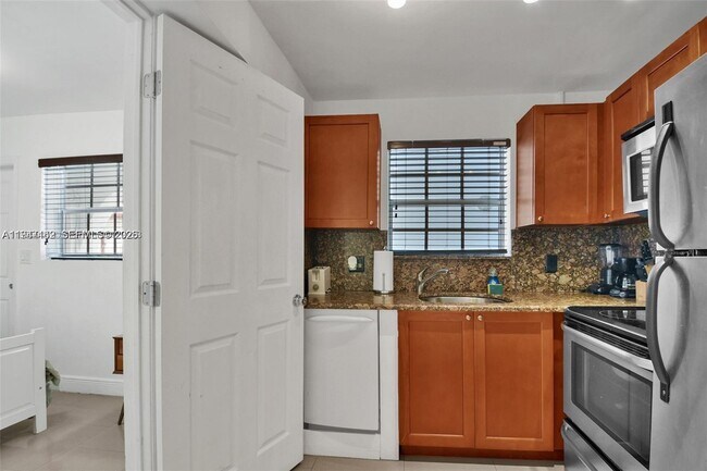 Building Photo - 6966 Byron Ave