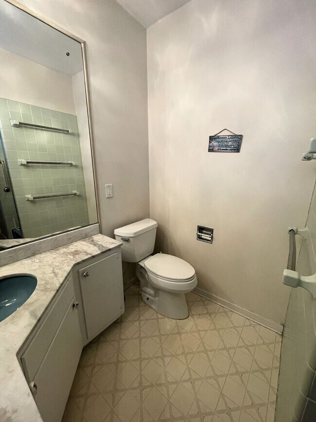 Building Photo - One Block to the Diag! Charming Home with Private Courtyard + Parking