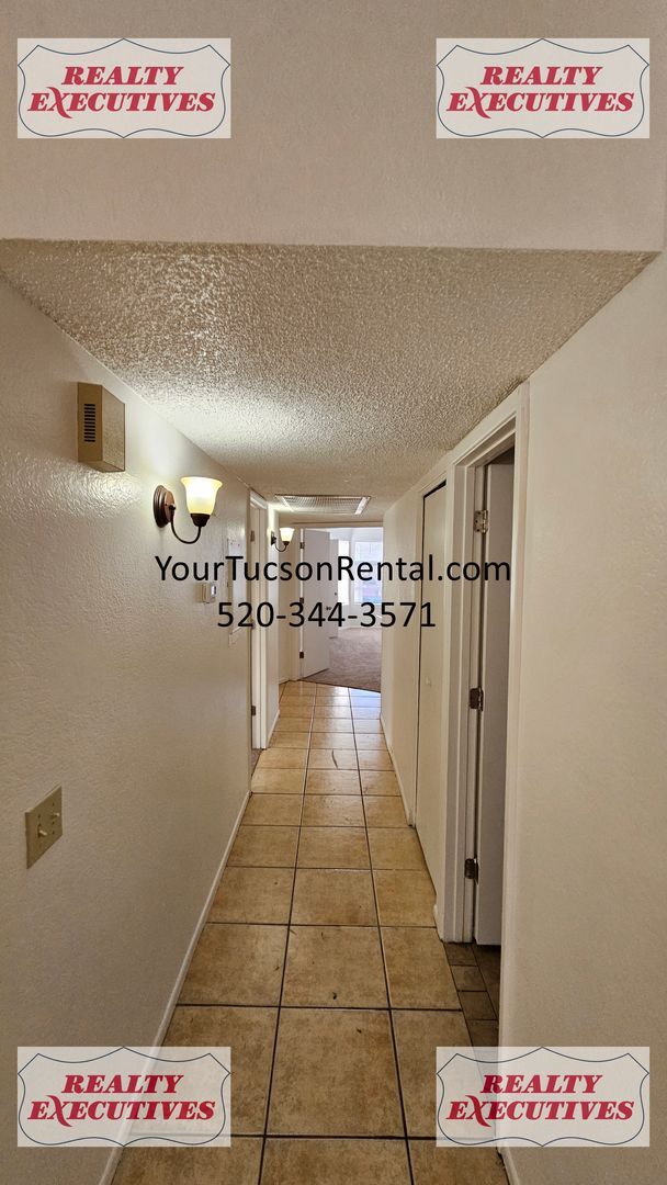 Building Photo - Downstairs - 3 Bedrooms and 2 baths with a...