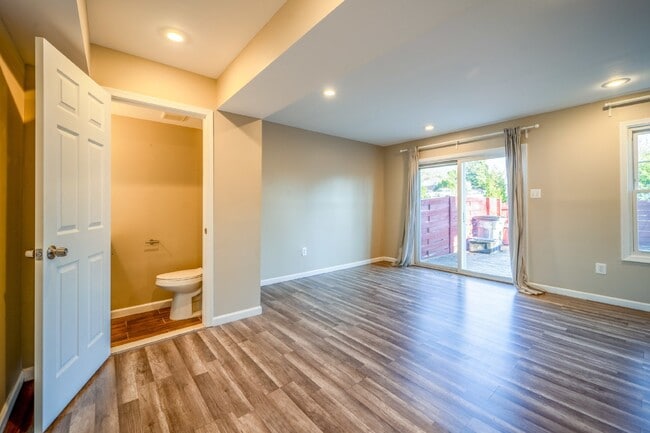 Building Photo - Spacious 3-Level Townhouse with Finished Basement and Fenced Patio