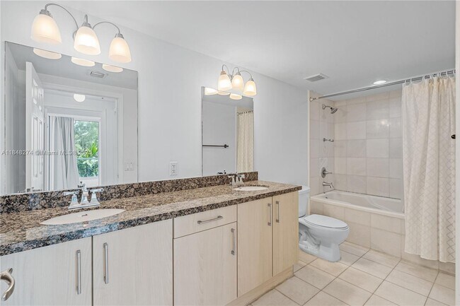 Building Photo - 6362 Collins Ave