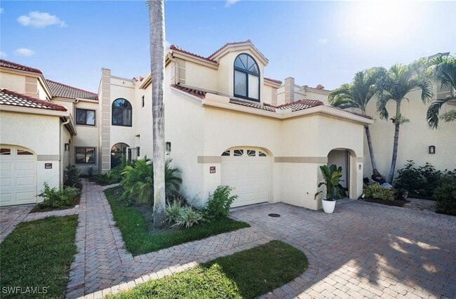Building Photo - 7056 Pelican Bay Blvd