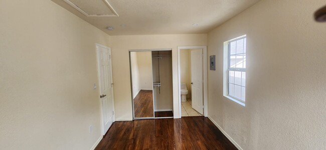 This is the bedroom with a picture of the closet - 3131 Euclid Ave