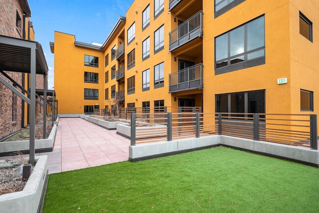 Building Photo - COME HOME TO REFINED DOWNTOWN LUXURY CONDO...