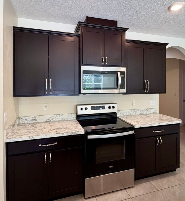 Building Photo - Palm Bay Pool Home Stunner!