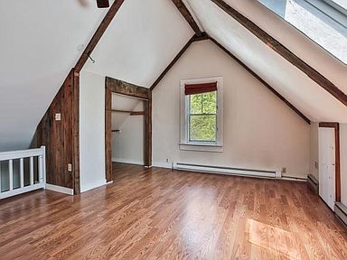 Living room with beams - 91 Maple St