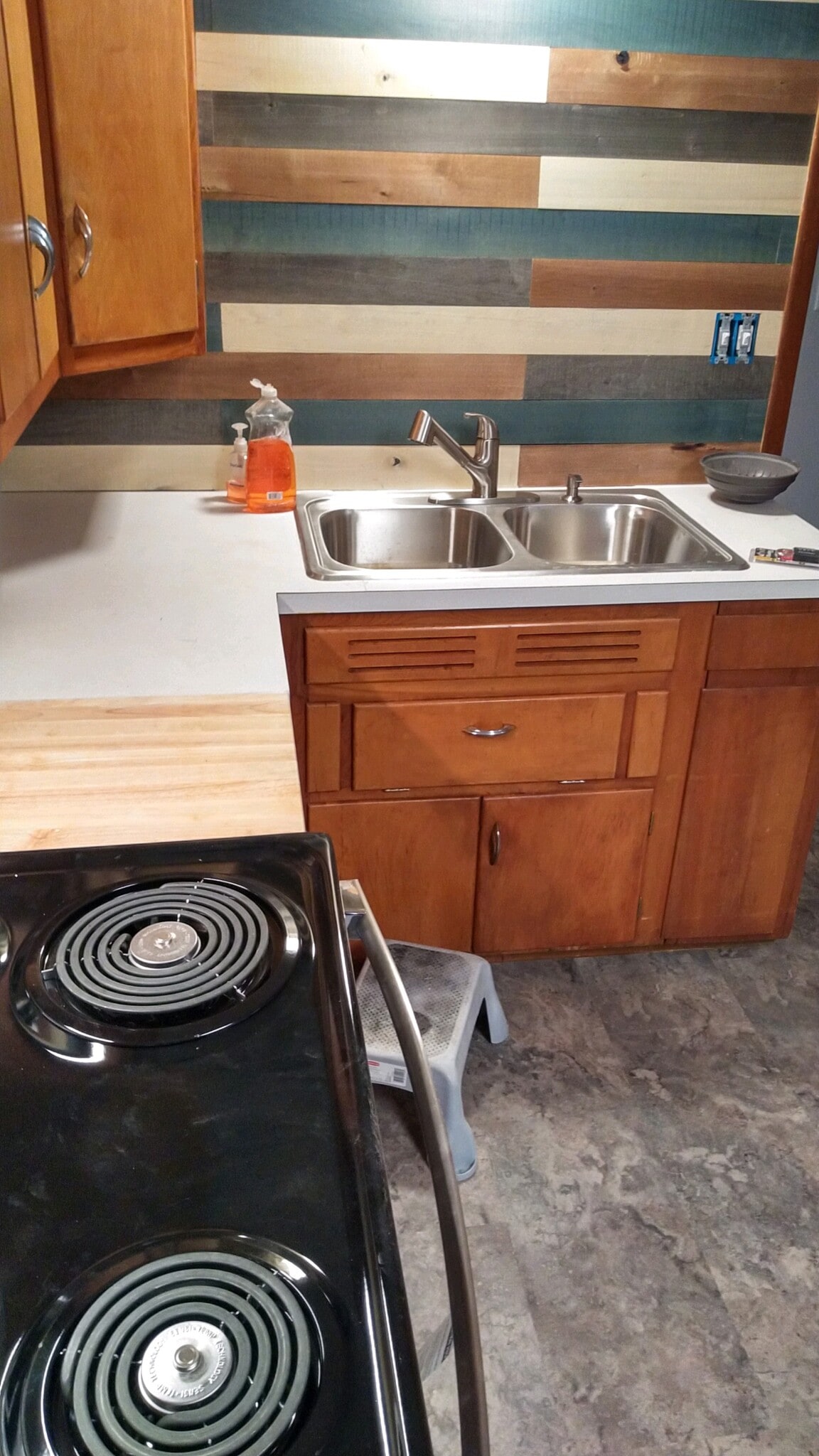 SS sink, cutting board part of countertop - 515 3rd Ave NW