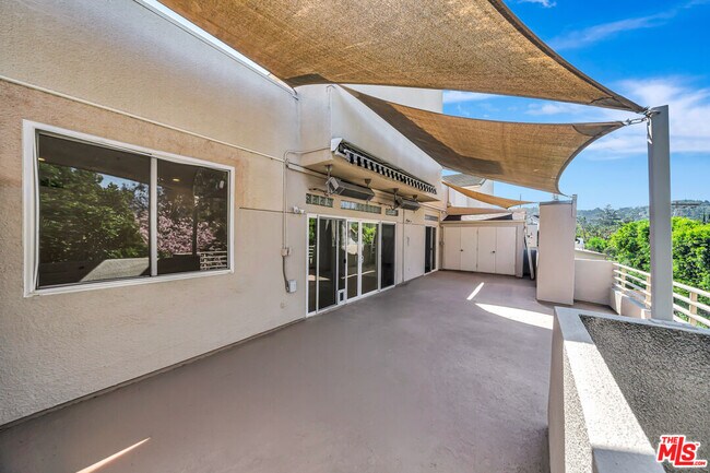 Building Photo - 4477 Woodman Ave