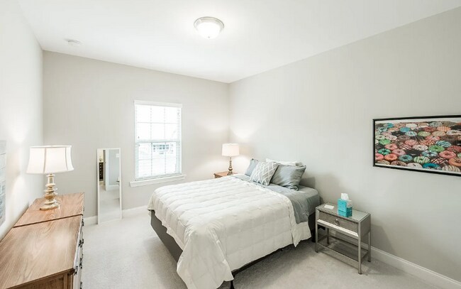 Building Photo - Upscale Modern Townhome nestled in the   G...