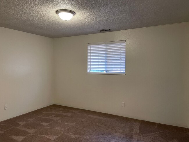 Building Photo - Nicely Tucked Away-3 Bed 2 Bath Home ~ New...
