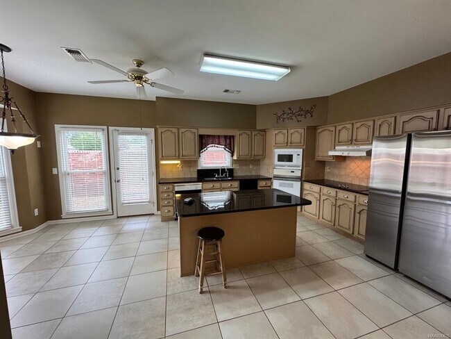 Building Photo - 8636 Harvest Ridge Dr