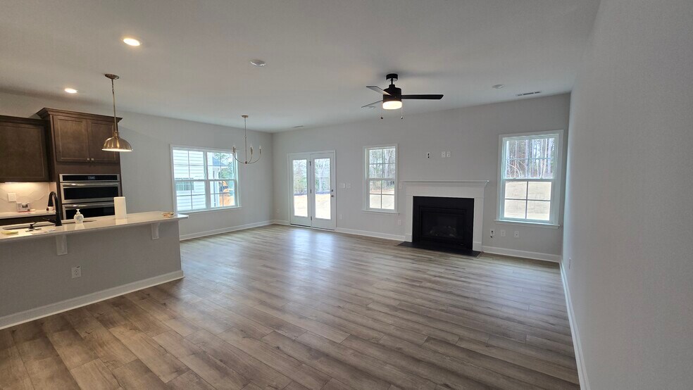 Living area + open concept kitchen - 55 Paper Birch Trl