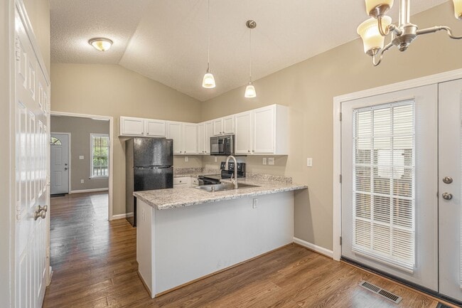 Building Photo - Like New Home off Freeman Mill.  Just Painted, New Wood/Vinyl Flooring, Vaulted Ceilings, Front P...