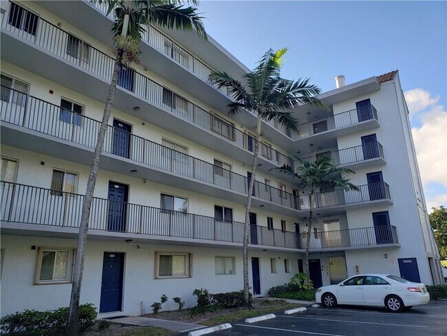 Building Photo - 8750 N Sherman Cir