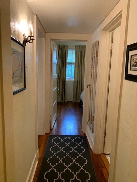 hallway linking kitchen, bedroom, and bathroom - 4036 Saint Charles Ave