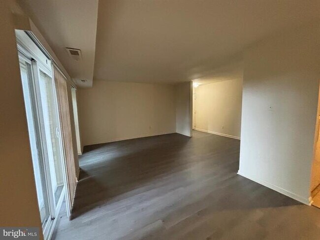 Building Photo - Charming Edsall Bluff Condo: Your Alexandria Oasis