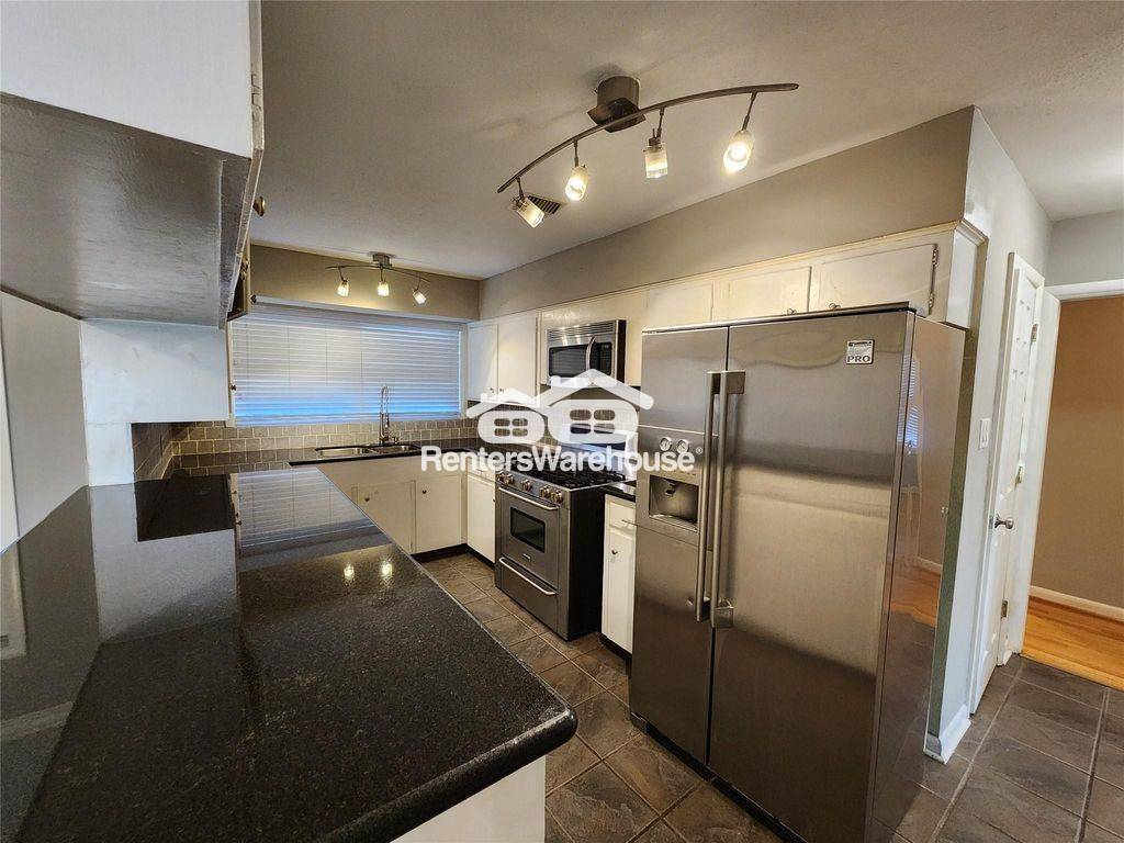 Building Photo - 6418 Woodbrook Ln