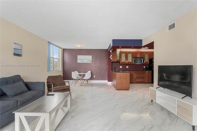 Building Photo - 9440 W Bay Harbor Dr