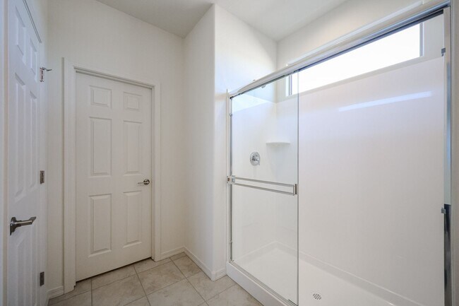 Building Photo - New 4 Bedroom + Den Home in Asante Community