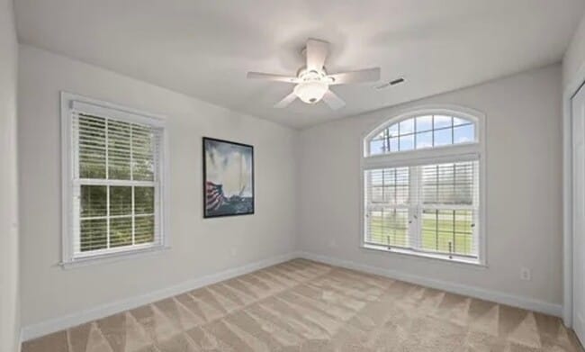 Building Photo - **Stately Brick Home in Fairfield Harbour | Tray Ceiling, Column, Bonus Room & Screened Porch**
