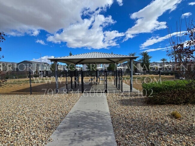 Building Photo - Gated~ 3 Bedroom ~ 2 Bath Townhome w/2 Car Garage~MUST SEE!