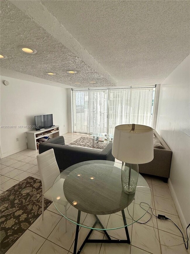 Building Photo - 5838 Collins Ave