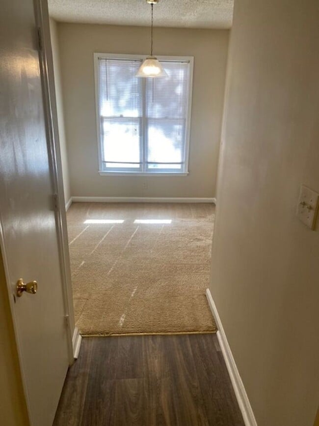 Building Photo - NOW AVAILABLE! Charming 2-Bedroom, 2-Bathroom Single-Level Townhome