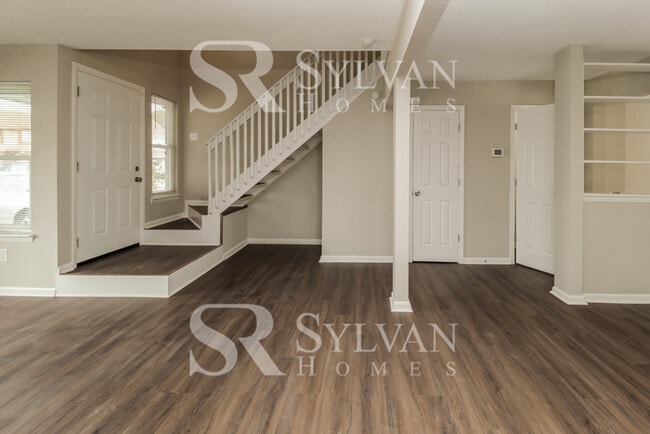 Building Photo - Welcome to this charming abode.
