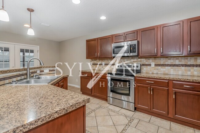 Building Photo - Lease today! No extra charge for contentme...