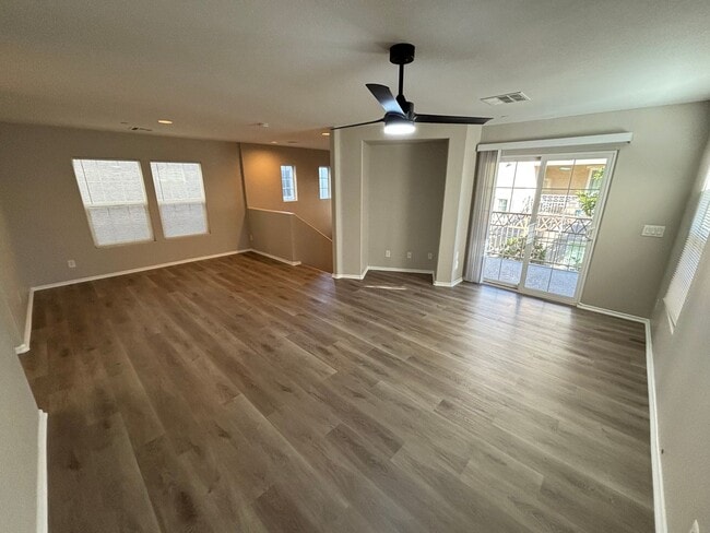 Building Photo - Spacious Tri-Level 4-Bedroom Home with Bal...