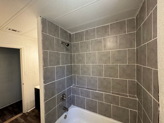 Building Photo - For Rent: Updated 3BR/2BA Home with Large ...
