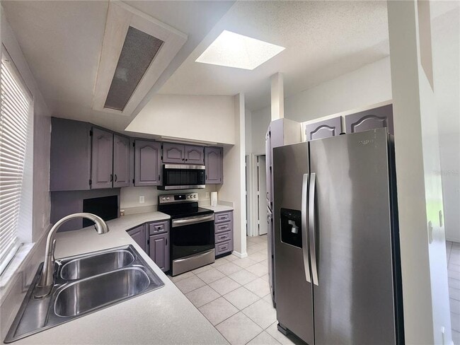 Building Photo - 9392 N Sandree Dr