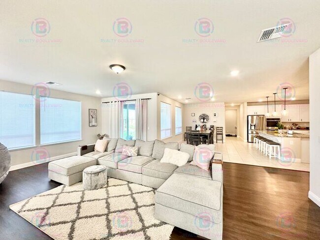 Building Photo - Welcome to your dream home, where modern elegance meets unparalleled convenience!