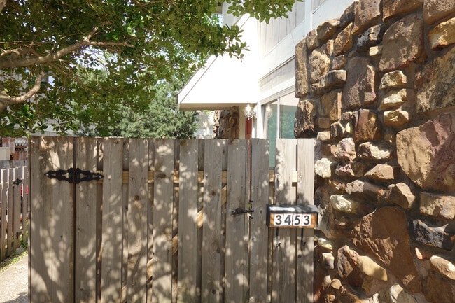 This unit has a privacy fenced front entry - 3453 E 35th St