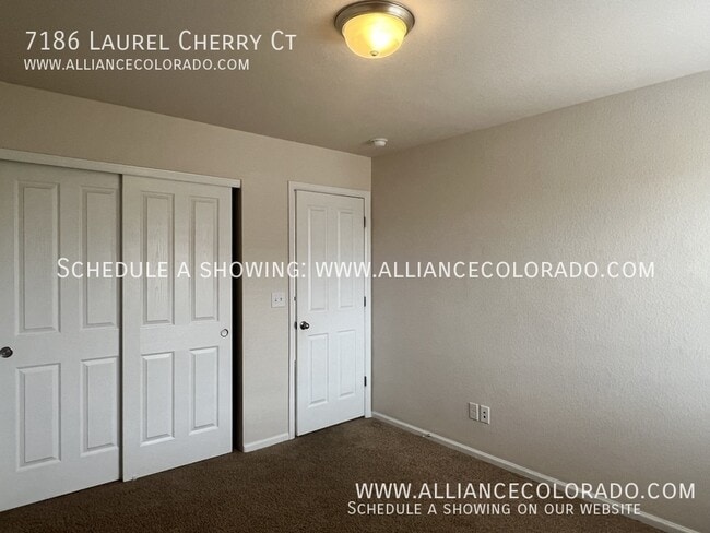 Building Photo - 7186 Laurel Cherry Ct