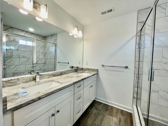 Building Photo - Practically New & Available NOW! Americana...