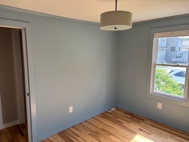 Reverse shot of the front-bedroom. On the left edge is the exit into the closet spaces / living room - 52 Rose St