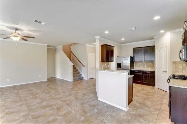 Building Photo - 4/3.5 in Teravista - Great home, Community...