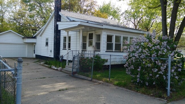 Primary Photo - 1343 E. Broadway. House with basement and ...