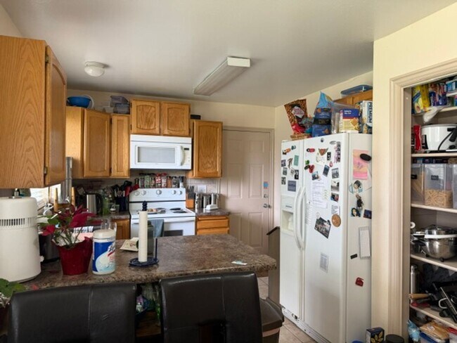 Building Photo - Cozy PG 3-Bedroom -- Large Fenced Yard