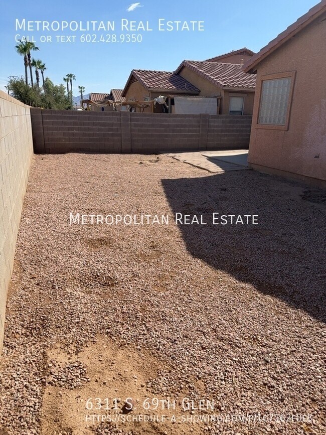 Building Photo - 6311 S 69th Glen